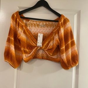 Urban Outfitters Crop Top. Super cute on. Brand New. Tags Attached. Size Large.